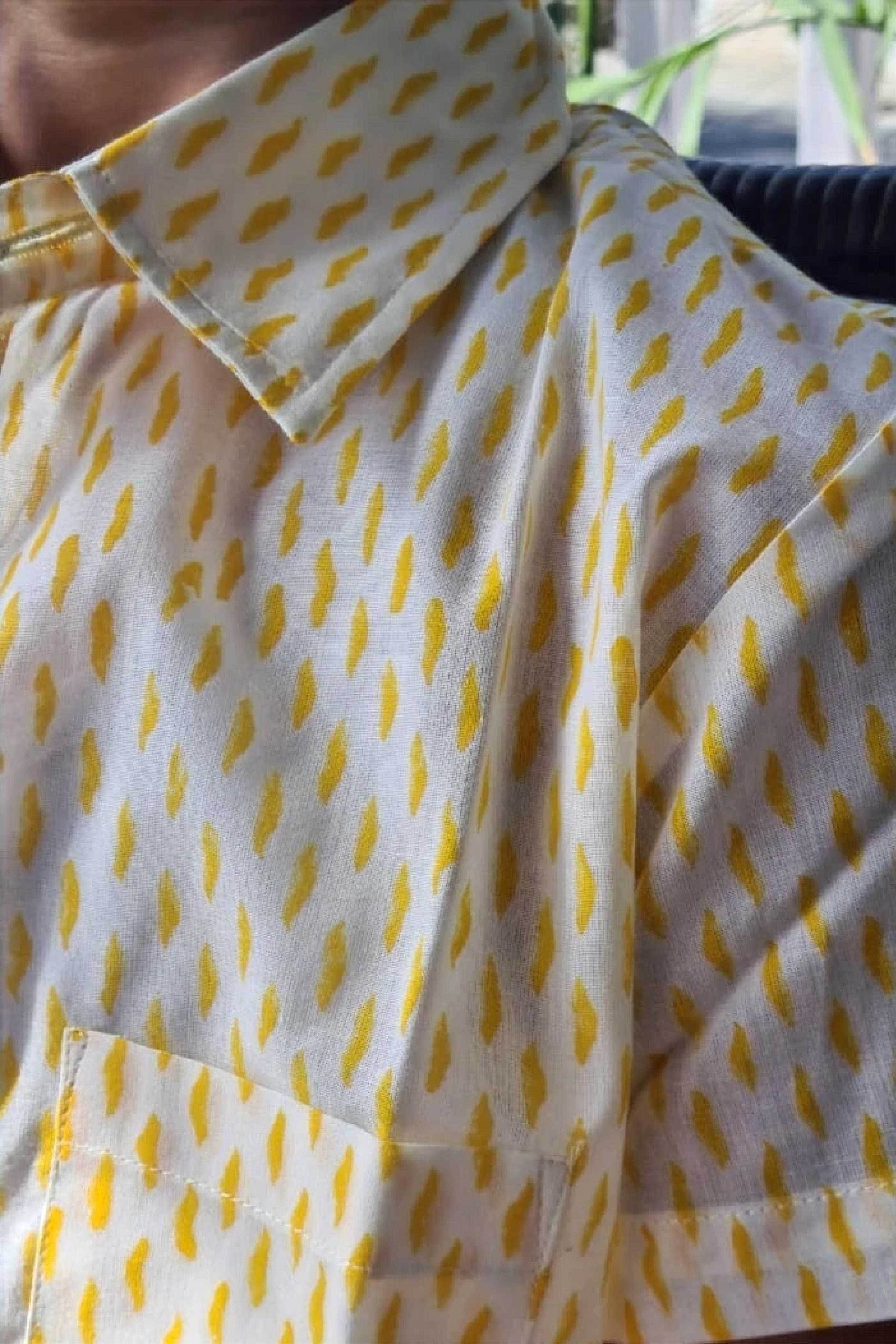 Boy Waves Yellow Shirt